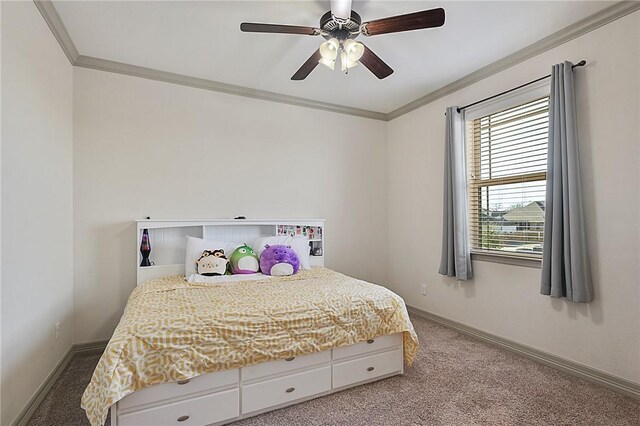 4111 Downton Abbey Ave, College Station, TX 77845 - bedroom with crown molding, baseboards, carpet, and a ceiling fan