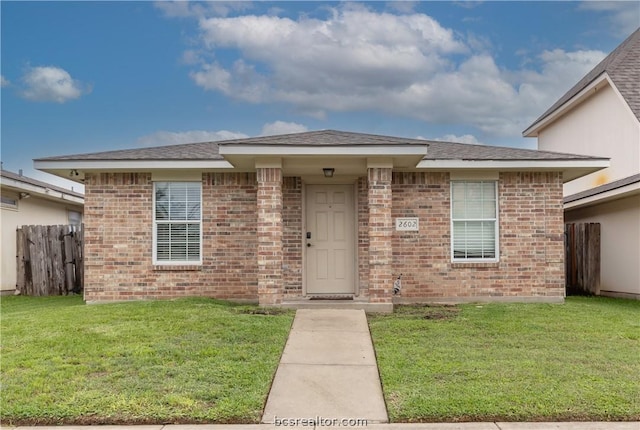 view of front of home with a front yard