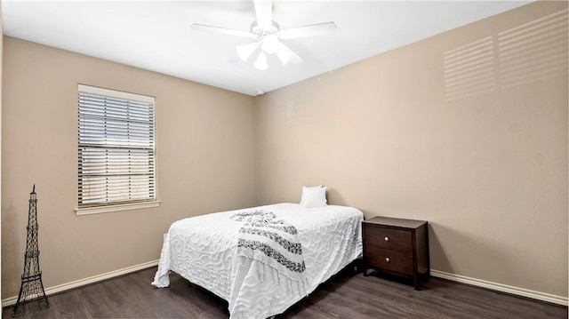 bedroom featuring ceiling fan and dark hardwood / wood-style flooring