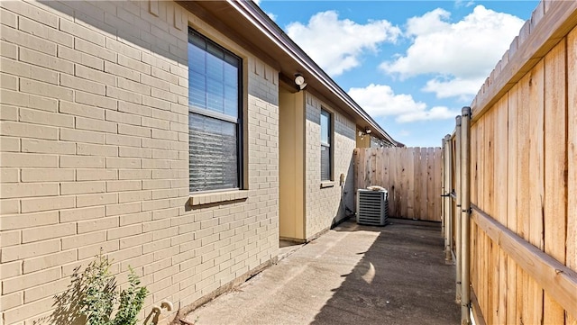 view of property exterior with central air condition unit