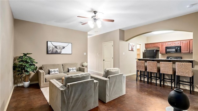 living room featuring ceiling fan