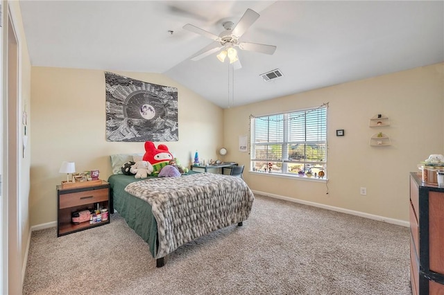 bedroom with carpet floors, baseboards, visible vents, and lofted ceiling