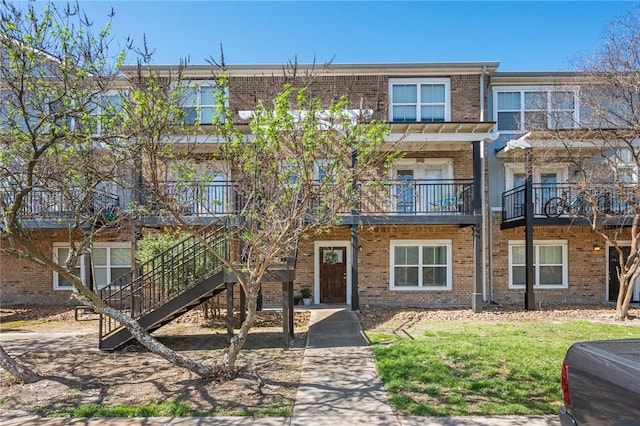 multi unit property featuring brick siding