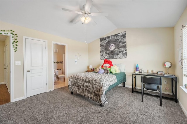 bedroom featuring carpet flooring, ceiling fan, vaulted ceiling, and connected bathroom