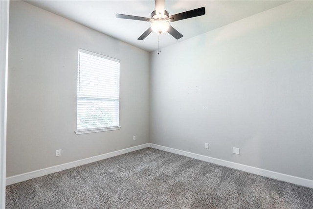 unfurnished room featuring carpet and ceiling fan