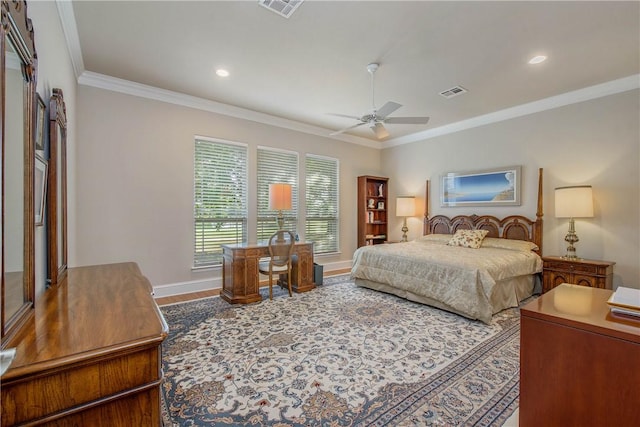 bedroom featuring ceiling fan and ornamental molding