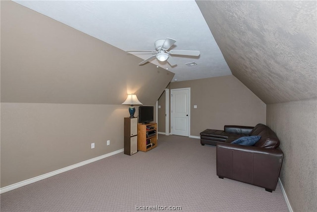 bonus room featuring carpet flooring, ceiling fan, a textured ceiling, and vaulted ceiling