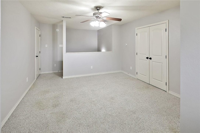 unfurnished room with ceiling fan