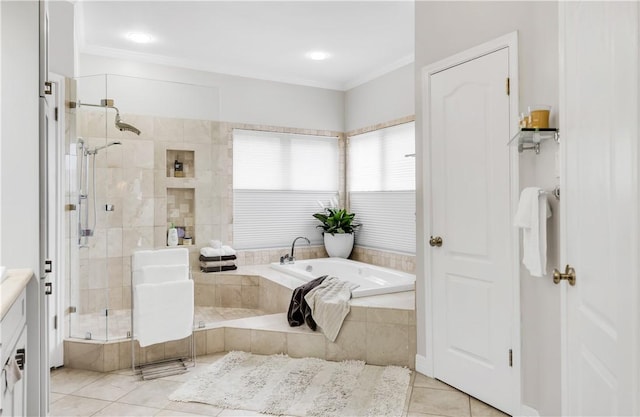 full bathroom featuring tile patterned floors, a garden tub, a stall shower, and crown molding