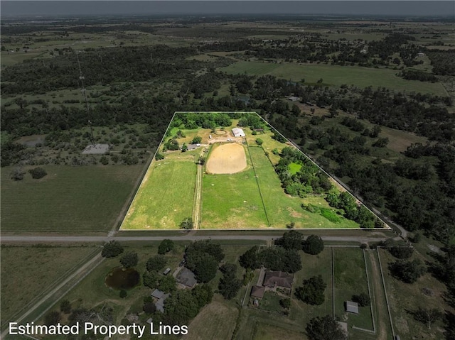 birds eye view of property featuring a rural view