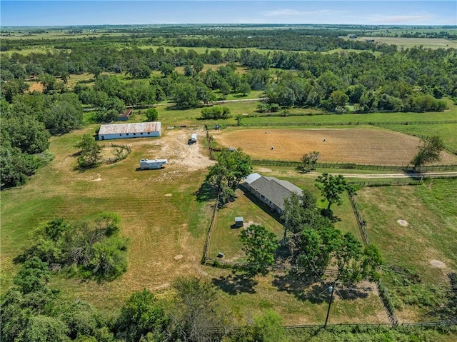 birds eye view of property with a rural view