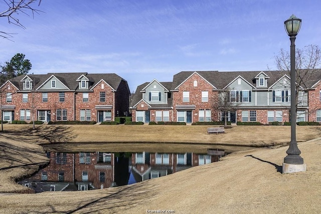 exterior space with a water view