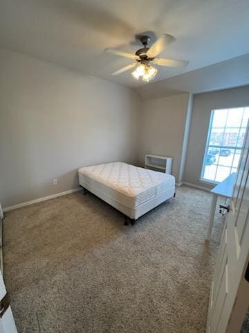 unfurnished bedroom with carpet and ceiling fan