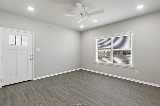 foyer featuring dark hardwood / wood-style flooring and ceiling fan