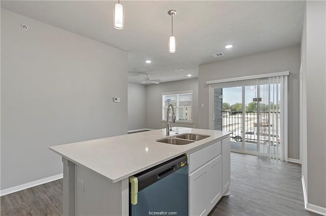 kitchen with dishwasher, pendant lighting, an island with sink, white cabinets, and sink