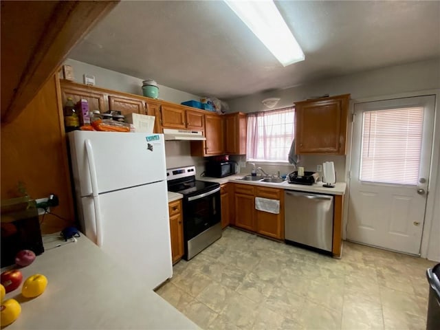 kitchen with appliances with stainless steel finishes and sink