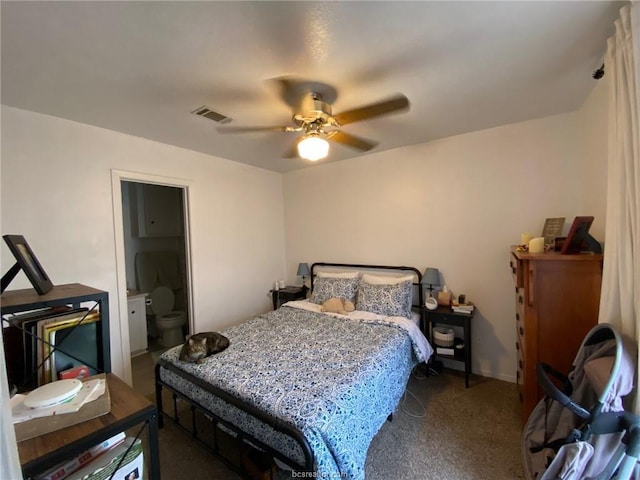 carpeted bedroom featuring connected bathroom and ceiling fan