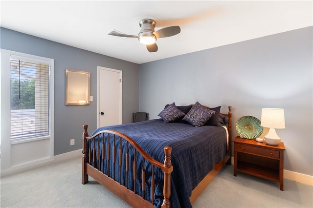 23 Forest Dr, College Station, TX 77840 - carpeted bedroom featuring baseboards and a ceiling fan