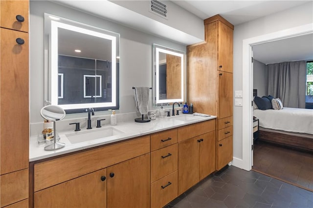 23 Forest Dr, College Station, TX 77840 - ensuite bathroom featuring tile patterned flooring and double vanity