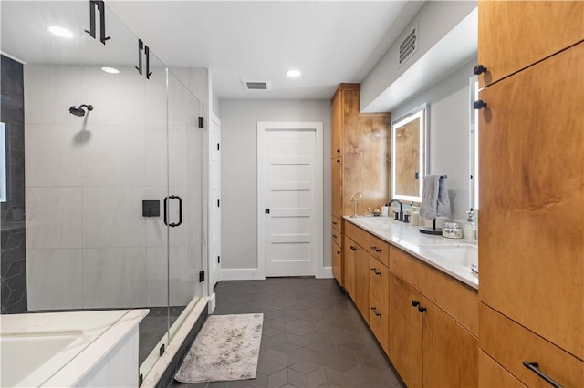 23 Forest Dr, College Station, TX 77840 - full bathroom featuring a stall shower, tile patterned floors, double vanity, recessed lighting, and baseboards