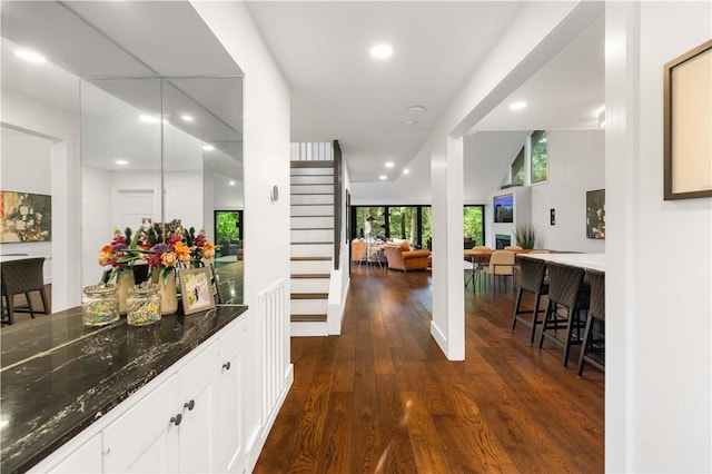 23 Forest Dr, College Station, TX 77840 - bar area featuring dark wood-style floors, recessed lighting, and stairway