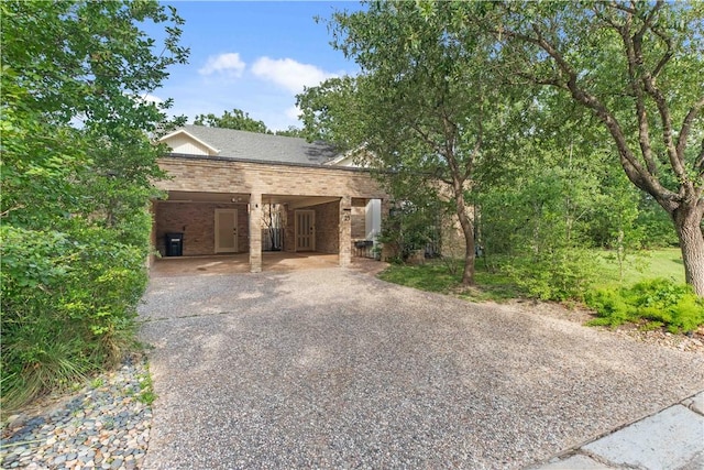 23 Forest Dr, College Station, TX 77840 - view of front of home with brick siding and driveway