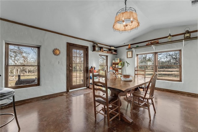 dining area with vaulted ceiling