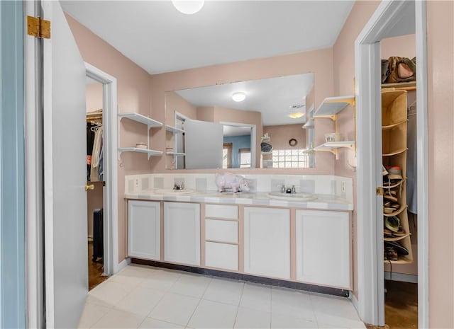 bathroom featuring vanity and tile patterned floors