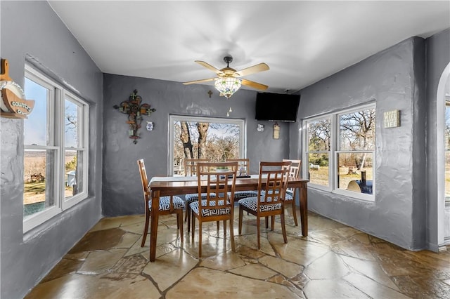 dining area featuring ceiling fan