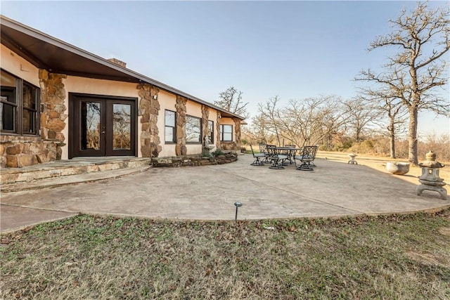 view of patio featuring french doors