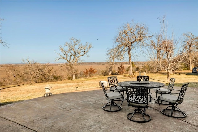 view of patio with a rural view