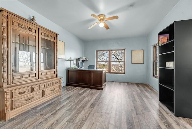 office area with hardwood / wood-style flooring and ceiling fan