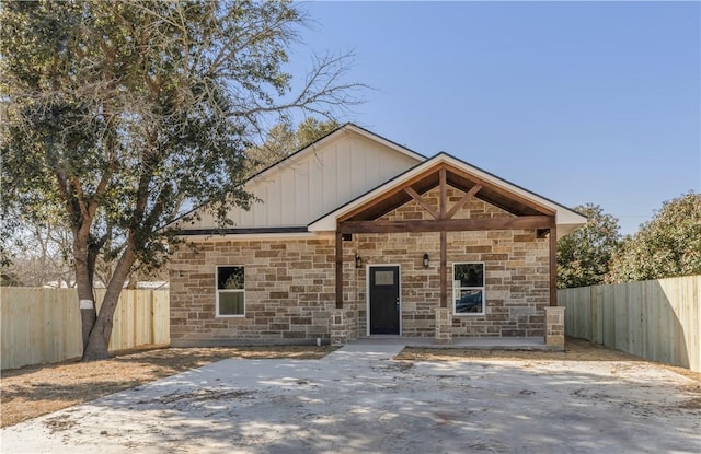 view of front of house with a patio area