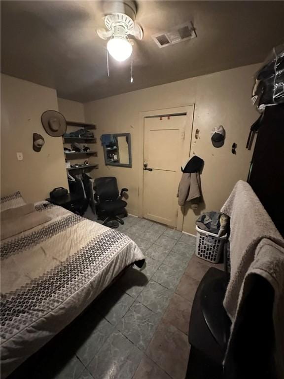 bedroom featuring ceiling fan