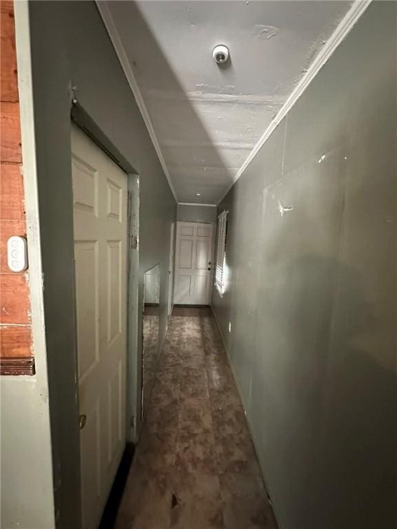 corridor featuring ornamental molding