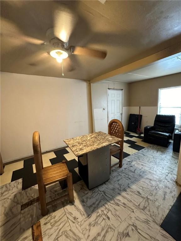 dining area with ceiling fan