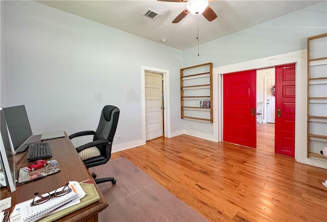 403N Banks St, Caldwell, TX 77836 - office area with ceiling fan, wood finished floors, and baseboards