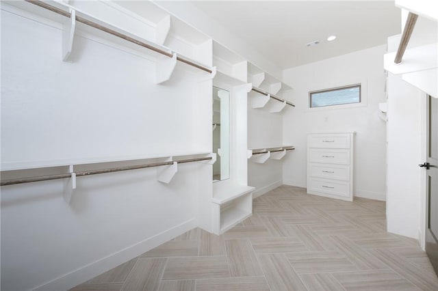 spacious closet with visible vents