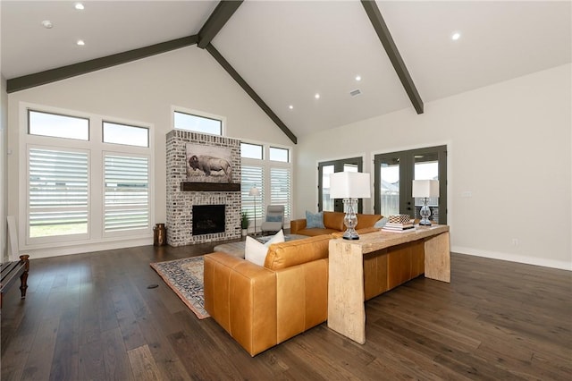 living area with dark wood-type flooring, beam ceiling, a fireplace, french doors, and high vaulted ceiling