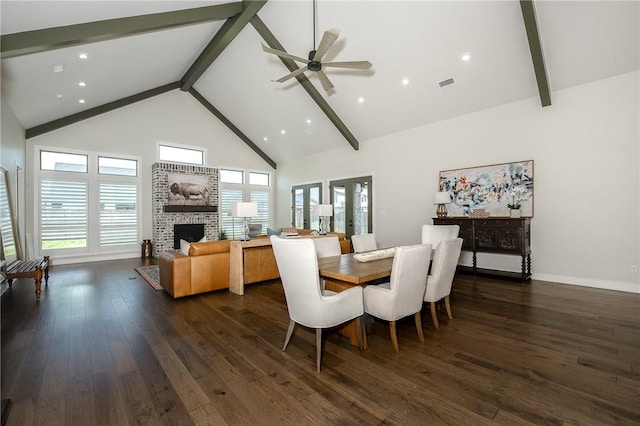 dining room featuring visible vents, a brick fireplace, beamed ceiling, dark wood-style floors, and high vaulted ceiling