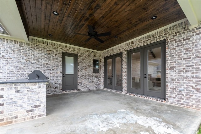 view of patio featuring french doors and ceiling fan