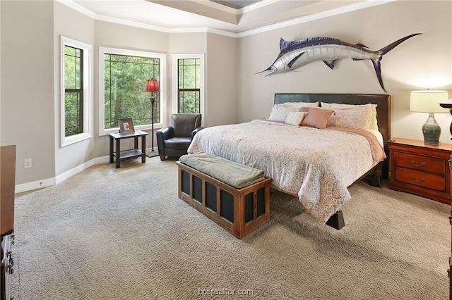 bedroom with crown molding and light colored carpet