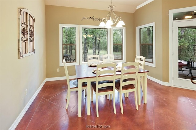 dining room with an inviting chandelier and dark tile patterned flooring