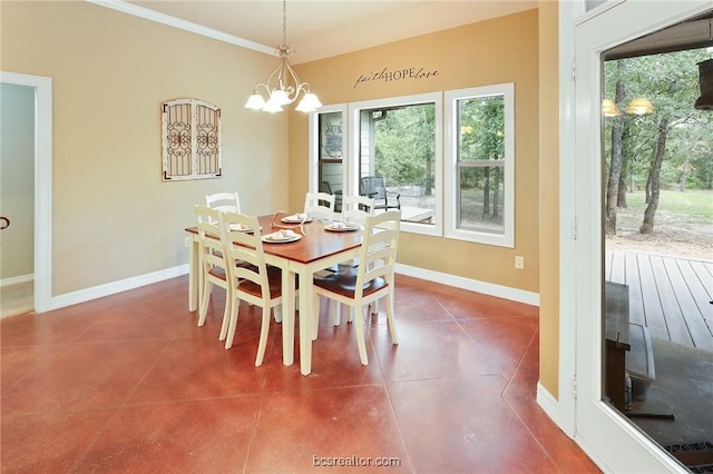 tiled dining room with an inviting chandelier and ornamental molding