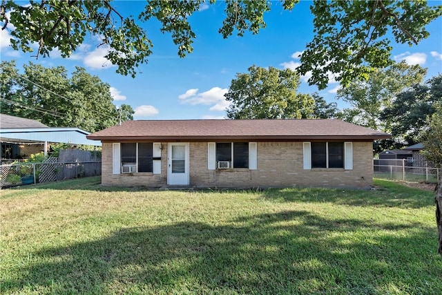 view of front of property with a front lawn