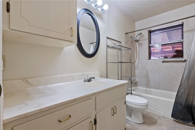 full bathroom with vanity, shower / bath combination with curtain, toilet, and a textured ceiling