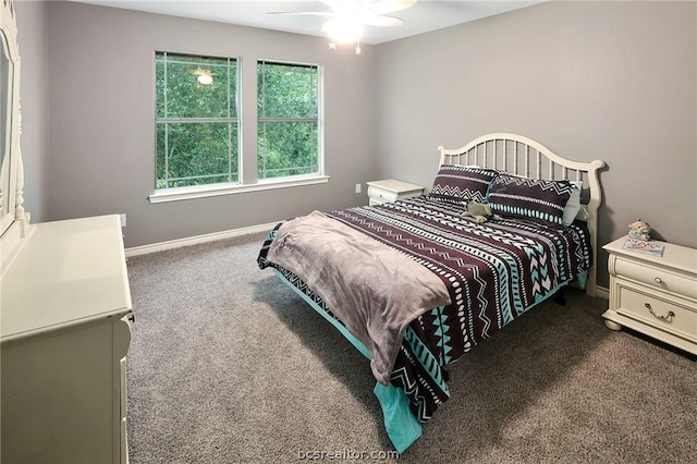 bedroom with ceiling fan and carpet floors