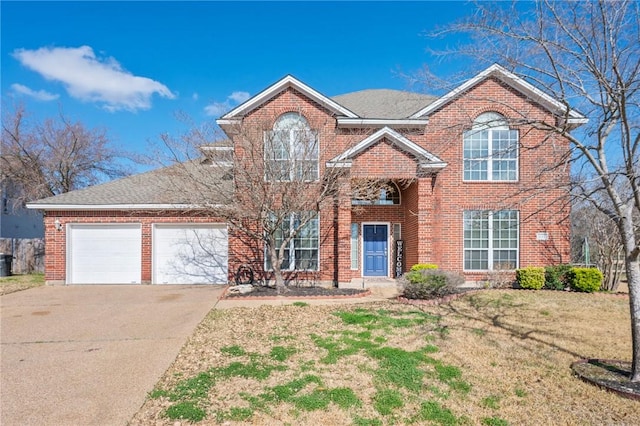 view of property with a garage and a front lawn