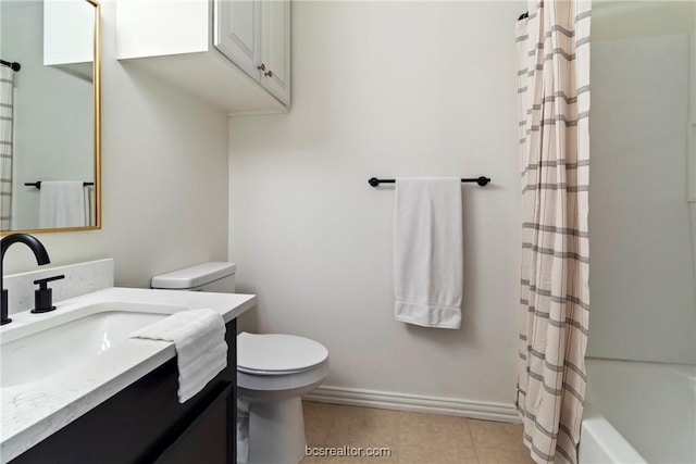 full bathroom with toilet, vanity, tile patterned floors, and shower / bath combo with shower curtain