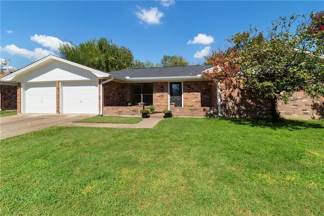 ranch-style home with a front yard and a garage